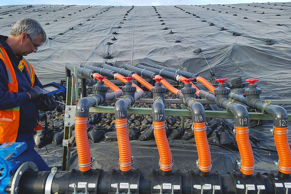 Operator working on a Landfill Gas Collection System