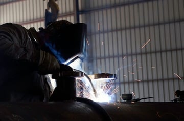 Welder working on equipment for Biogas Facility -  Balance of Plant  - BOP - Equipment Engineering Fabrication -